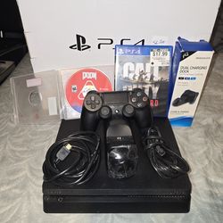 PS4 Slim 1TB Bundle - Ready to Play! (2 Games + Dual Charging Dock)