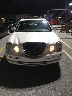 2006 Kia amanti pearl white ,loaded