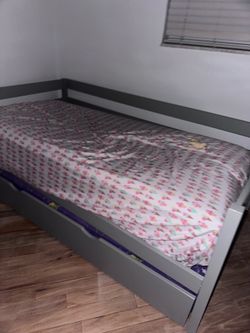 Day bed and pull bed underneath.