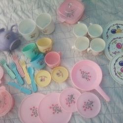 Several Different Sets Of Toy Dishes And Pots And Pans For A Mini  Kitchen
