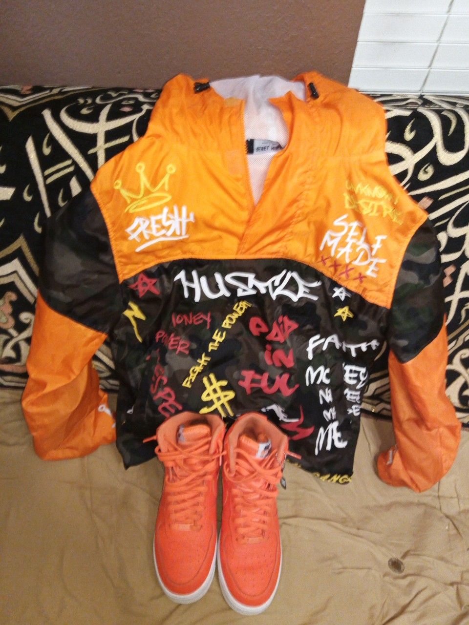 Orange and white Nike air forces with rebel minds designer jacket with hoodie