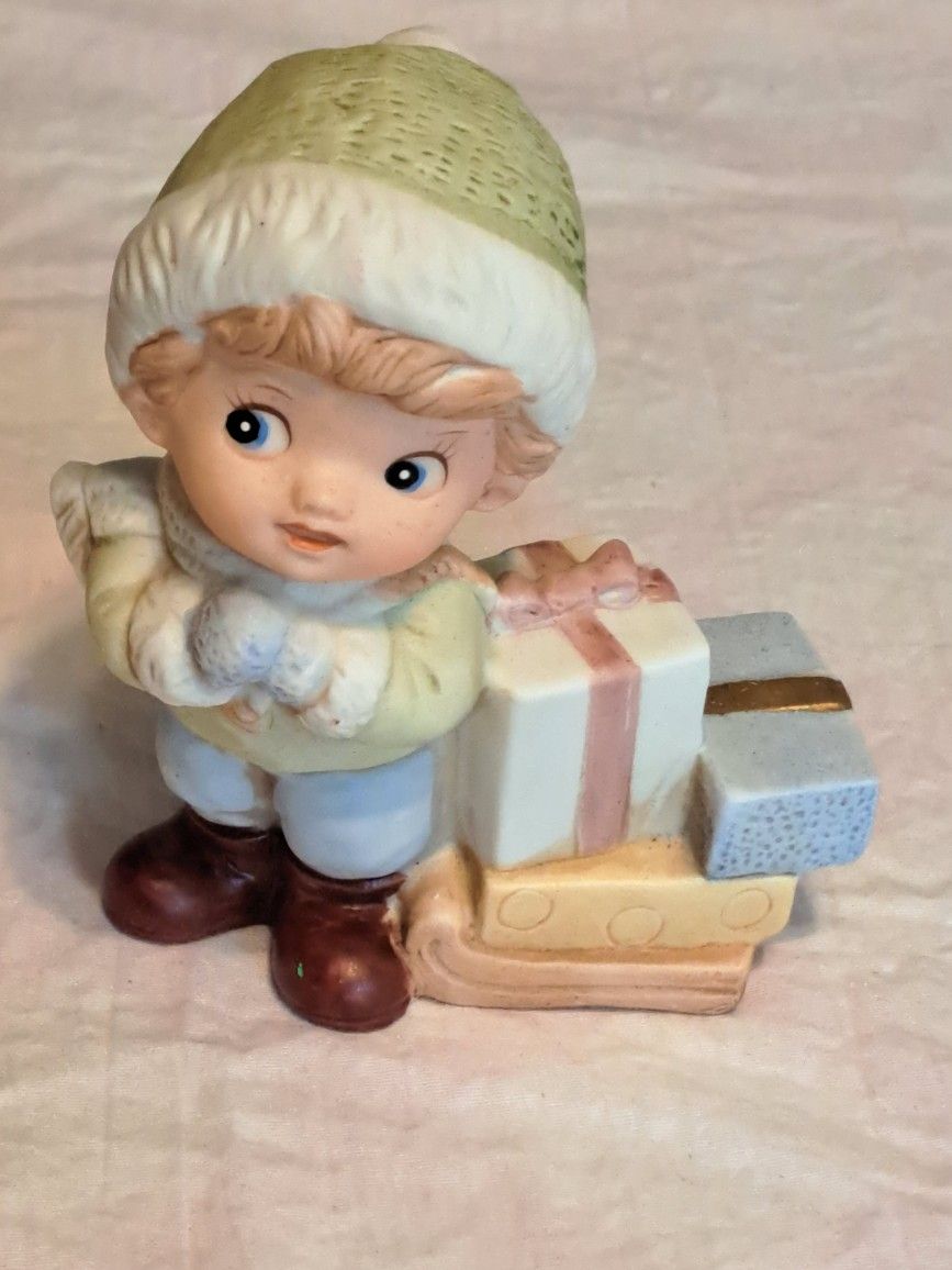 Homco Figurine #5556 Boy With Sled & Packages