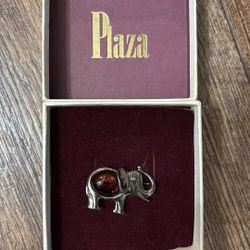 vintage sterling silver elephant brooch with an amber cabochon "jelly belly" stone