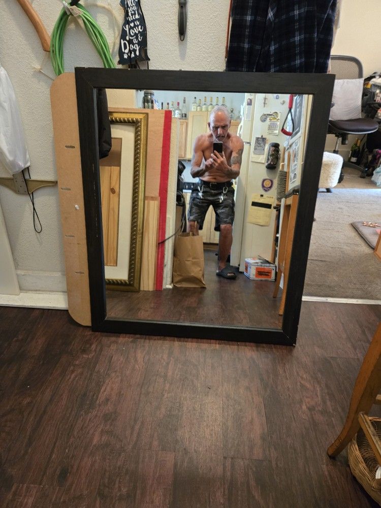 Wood Framed Mirror. 35 1/4"T X 41 1/2"W.