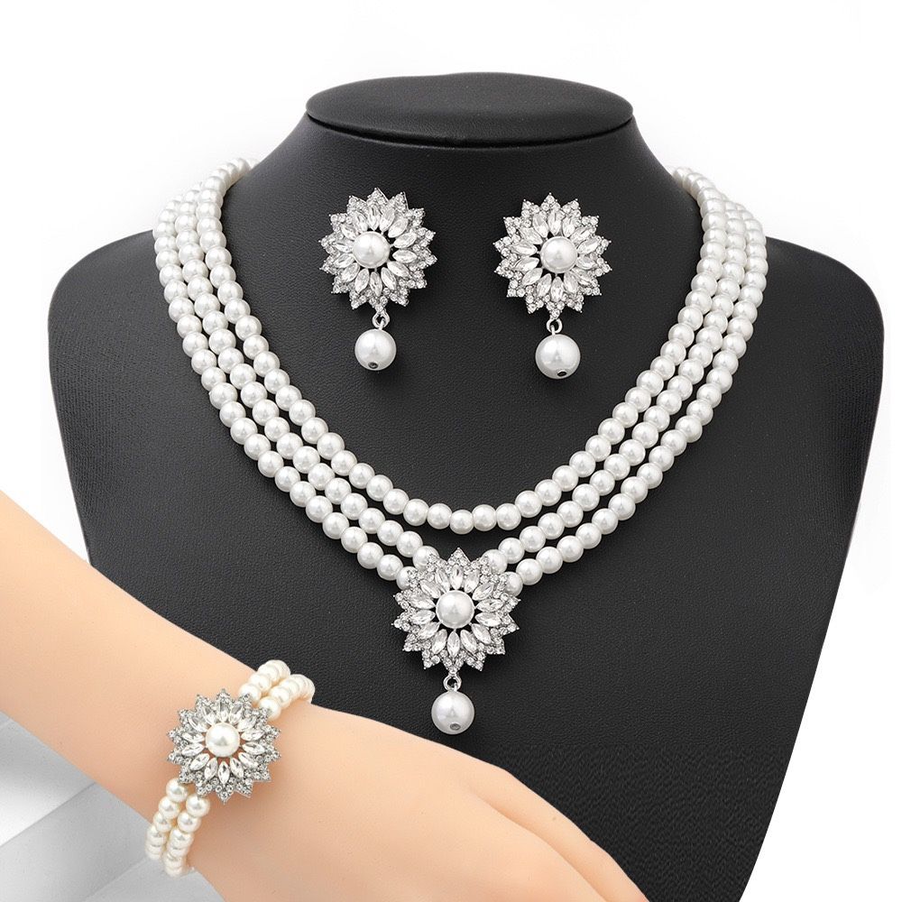 Fashion pearl necklace, earrings and bracelet set
