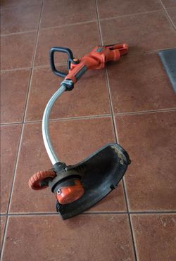 BLACK+DECKER corded electric string trimmer/edger (weed eater).