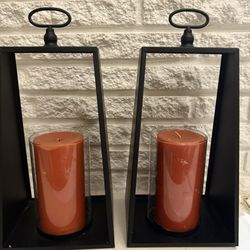 Pair of iron candle holders, candles not included