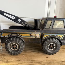 Vintage Tonka wrecker tow truck black - pressed steel Original