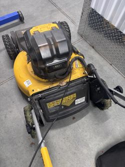 DEWALT SELF DRIVE MOWER W/BATTERIES $350