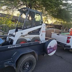 Dump Trailer And Bobcat