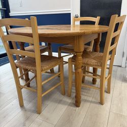Solid Round Dropleaf Table With 4 Chairs 