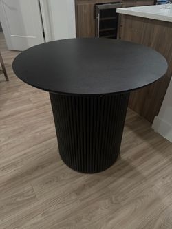 Black Round Dining Table with Fluted Pedestal Base