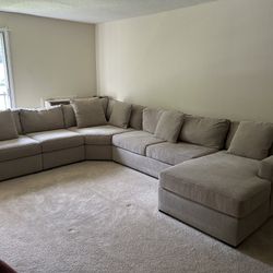 Beige L shaped sofa 