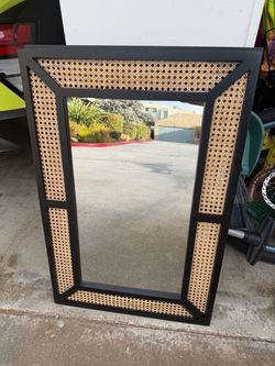 Pair black & rattan rectangular vanity mirrors