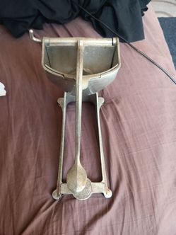 Wear Ever aluminum squeezer