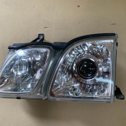 99 Lexus LX470 Headlight(Pair) OEM