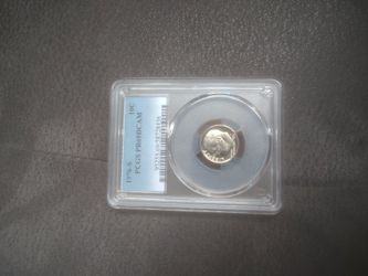 Graded coin in slab