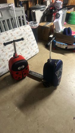 Travel suit case with scooter