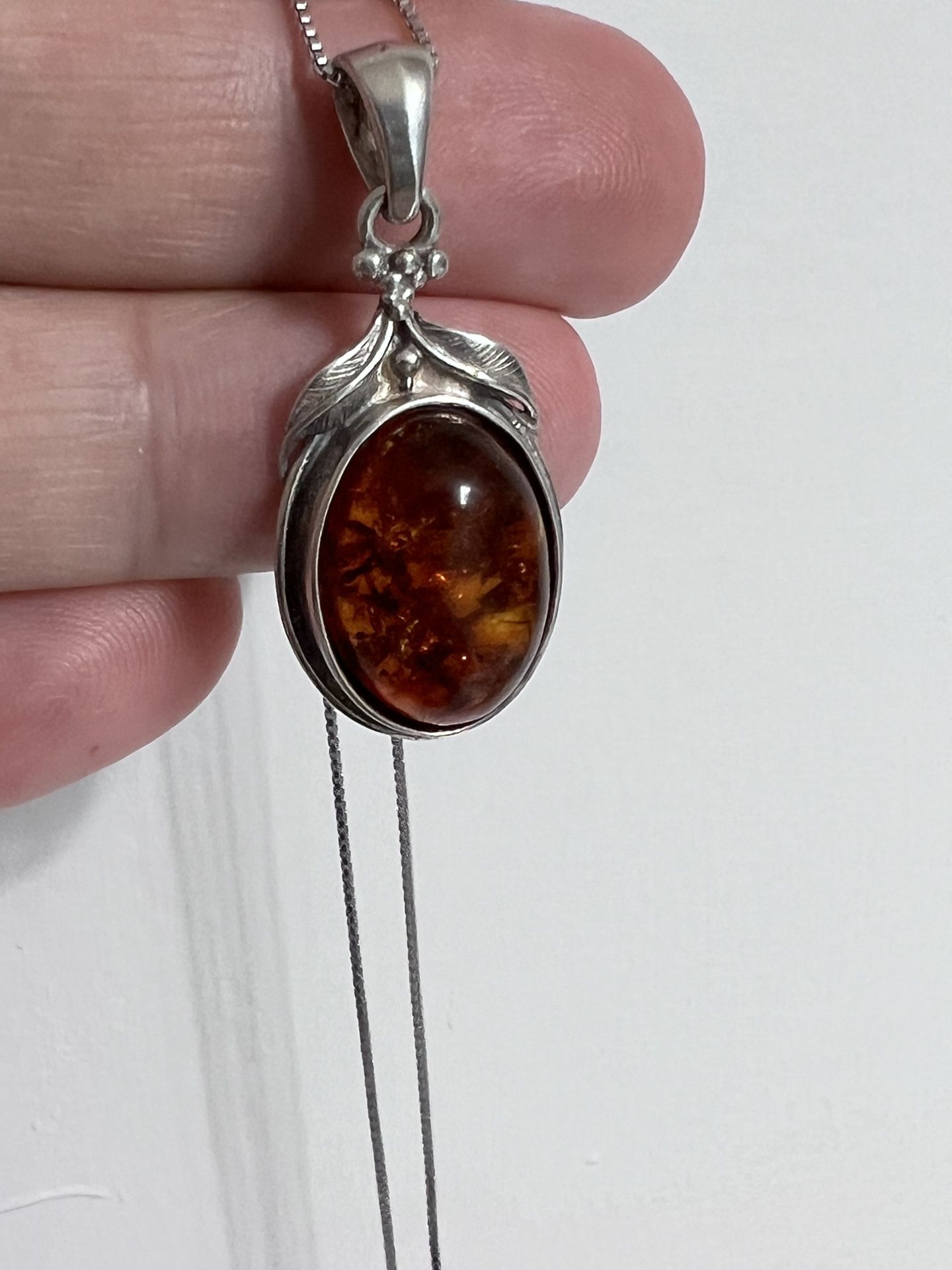 Amber Sterling Silver Necklace with chain.