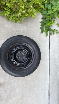 225/65R15 used like new tire
