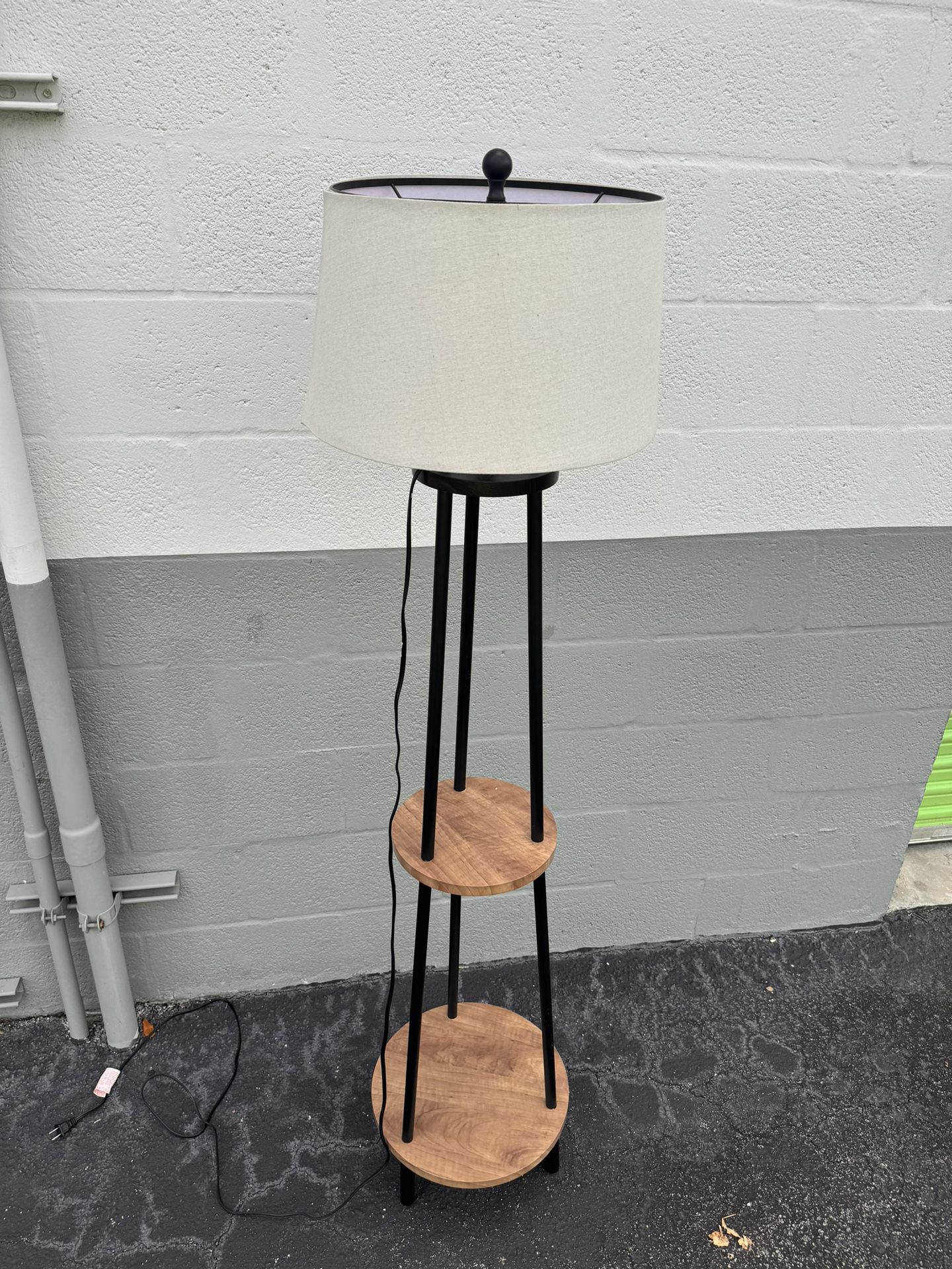 Three legged lamp with white shade post 5 feet and 3 inches tall 