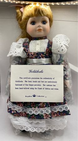 A vintage Goldilocks porcelain collector doll