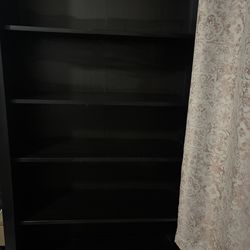Tall black cabinet