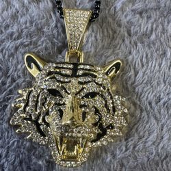 Mens new without tags Gold blinged out tiger pendant and 24 inch Black box chain. 