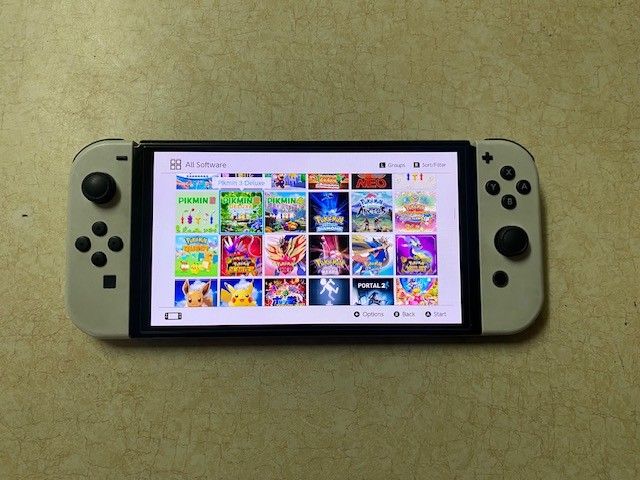 Switch OLED with 120 Popular Games