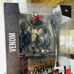 Venom Statue With Comic 