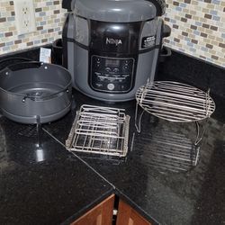 Ninja  Foodi 6.5 Quart Pressure Cooker & Air
Fryer