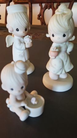  Precious Moments Porcelain Figurines 