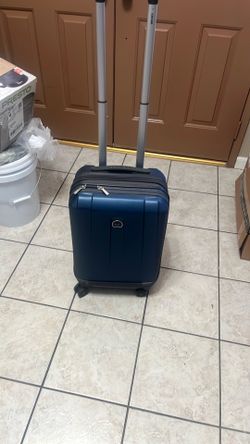 20 inches carry on Delsey luggage