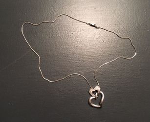 Diamond pendant with necklace. Silver