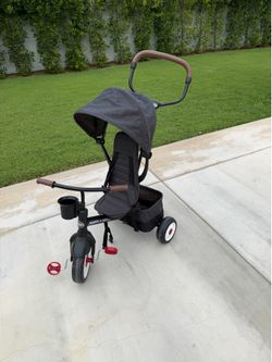 Child’s stroller‑tricycle hybrid