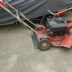 Old Snow Blowers And Old Toro Mower 