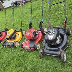 Lawn machinery for sale. Prices vary depending on the item.