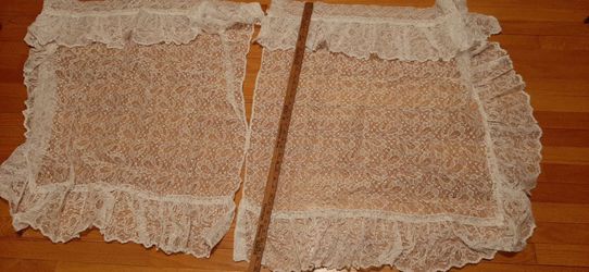 2 lace curtains, ruffled edges & tie backs