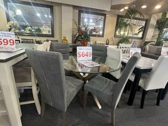 Brand new round glass top and 4 gray chairs