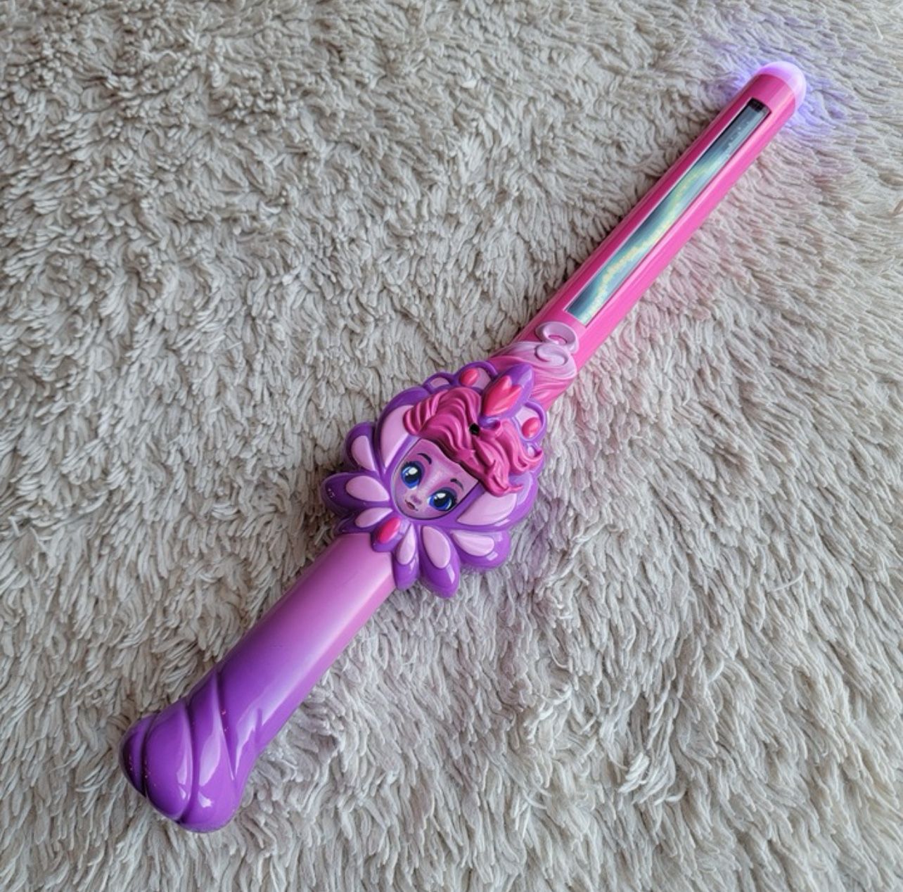 Enchant your child's playtime with this magical pink and purple wand.