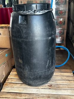 Black plastic storage container drums with lids