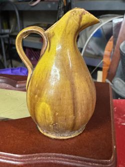 A vintage drip glaze pottery, pitcher