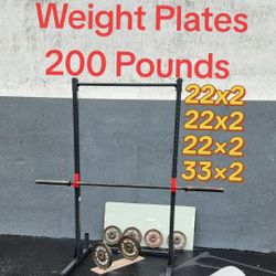 $250. Weight Plates 23²+23²+23²+33³ :198 POUNDS + BAR+ BENCH + Rack / PULL Ups + J Hooks.DeliveryFee