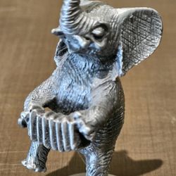 Vintage pewter Hudson pewter usa stamped elephant playing accordian