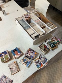 Box of baseball cards different brands different years 80s 90s