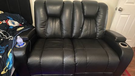 This black couch is for two people