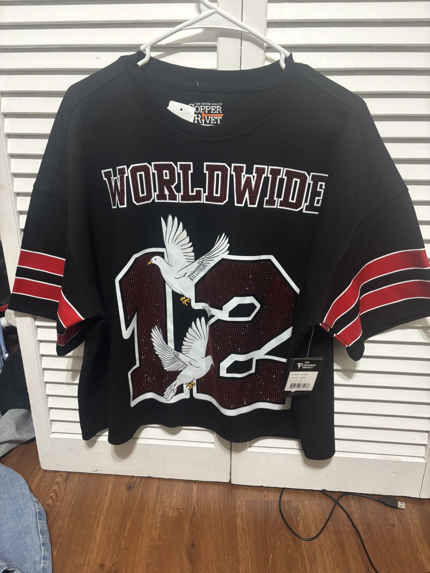 black, red, jersey, streetwear, graphic, oversized, athletic, bold, sports-inspired