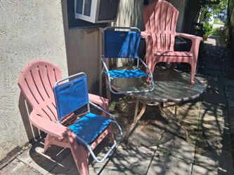 Patio table comes with 3 Adirondack chairs & 2 beach chairs