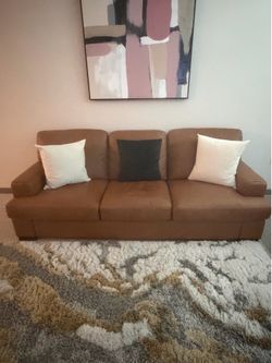 Brown leather couch 85” new condition must sell