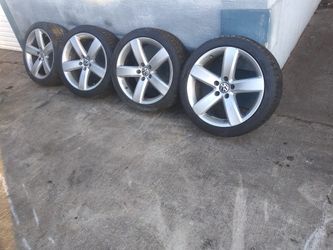 Set of wheels and tires for Volkswagen cc, tire size is 235/40/18 in good condition; please call or text {contact info removed}